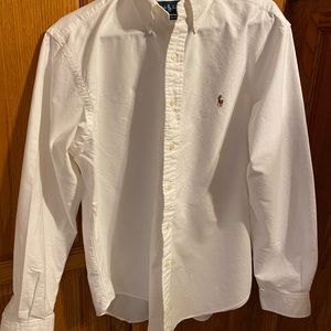 Classic fit white long sleeve polo with polo logo on chest. Great piece